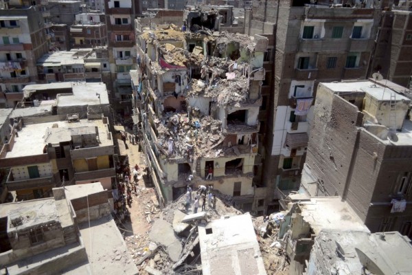An 8-story apt bldg in Alexandria, Egypt collapses.  Built only 5 years ago, this type of collapse is typically blamed on violations of building specs and bribery of gov't officials.