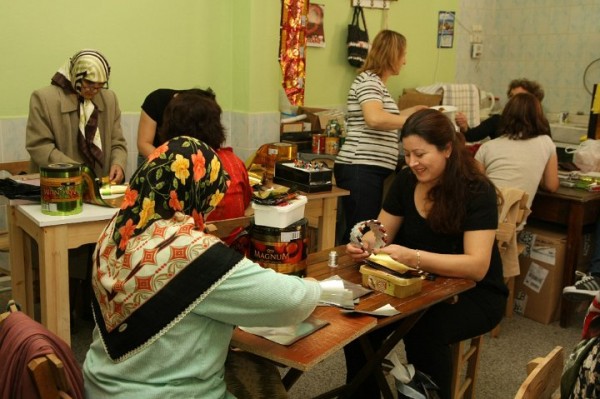 Very few women have been allowed to work in the conservative Muslim town of Ayvelik, Turkey. A community project was recently started that hires local women to produce fashionable handbags made from discarded trash to both reduce waste and provide the women with a reliable income for the first time in their lives.