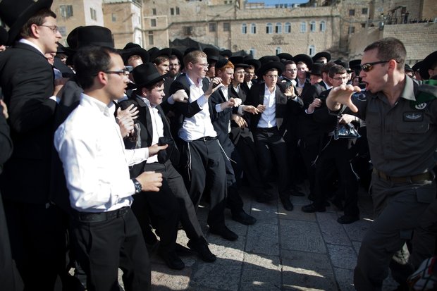 For the first time in Israel's history, police fought off thousands of Ultra-Orthodox Jews who were protesting the  "Women of the Wall", a Jewish women's group that recently won a court ruling allowing them to pray at the Western Wall in Jerusalem just as men do.  