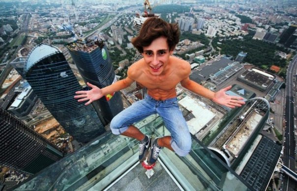 The "skywalking" craze started in Moscow where roofers illegally climb a skyscraper, hang out on a ledge without safety harnesses, and post their photo on the internet.  They have discovered a world where no rules or laws apply, where they can be heroes even if for only a few minutes.  "It's a form of escapism that cries out for attention and recognition," a Moscow psychologist says.