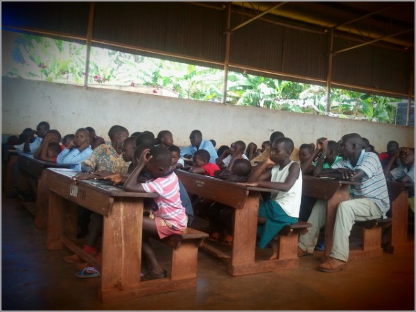 Class rooms in Uganda can have up to 80 students, and many have no books.  Learning is all done orally. The following organization collects donations for books and buys them locally to save costs: http://www.turnthepageuganda.org/p/donate.html