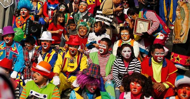 Clowns pose in Mexico City. A poll of nearly 150,000 people around the world says seven of the world’s 10 countries with the most upbeat attitudes are in Latin America