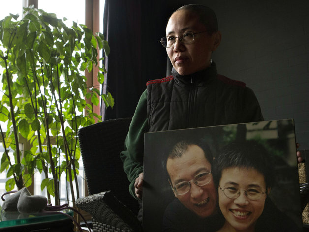 Liu Xia, a Chinese poet, painter and photographer,has been living under house arrest in her Beijing apt with no  no access to the internet or phones.  She is married to Liu Xiaobo who received the Nobel Peace Prize in 2010 while in prison serving out a 11-year sentence for "subversion" after he circulated a charter calling for democratic reforms.  Liu Xia has recently appealed to President Xi Jinping to choose "justice" over "merciless oppression". 