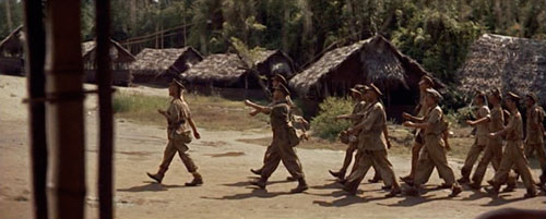 In the 1957 WWII film Bridge on the River Kwai, British prisoners of war are marched into a Japanese prison camp, led by Colonel Nicholson (played by actor Alec Guinness). As a sign of strength, dignity and defiance, they enter the camp whistling the Colonel Bogey March. See http://www.youtube.com/watch?v=83bmsluWHZctp://www.youtube.com/watch?v=83bmsluWHZc