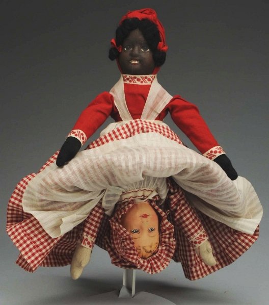 Topsy-turvy dolls were double ended and traditionally had a black girl on one side and a white girl on the other.  Its origins date back to the Civil War, and many theorists believe they were first produced for slave children who were forbidden to play with white dolls.  When no one was looking, they could turn the doll over.